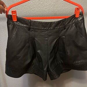 Gently worn faux leather shorts